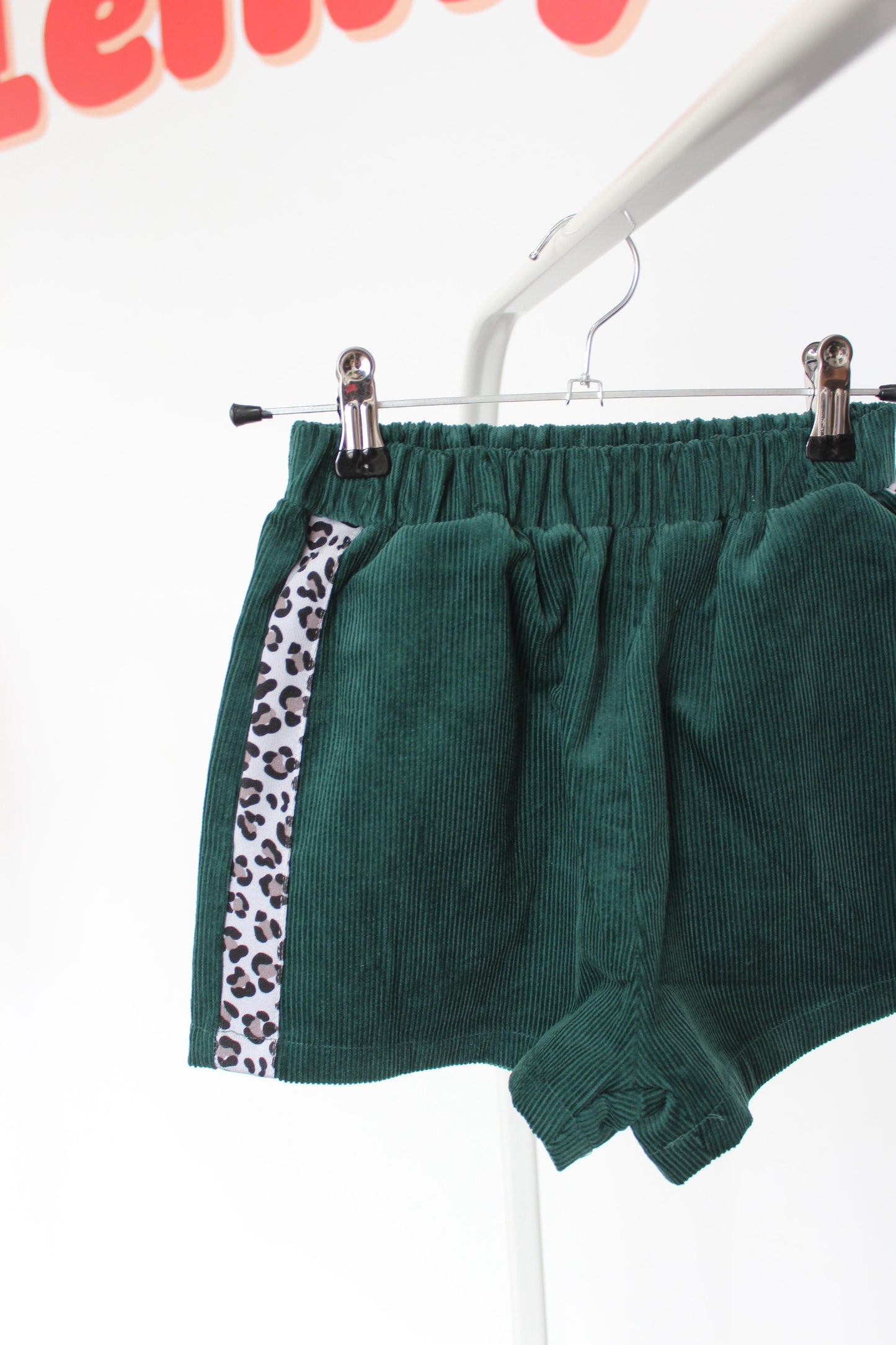 green cord shorts for kids with leopard stripe down side