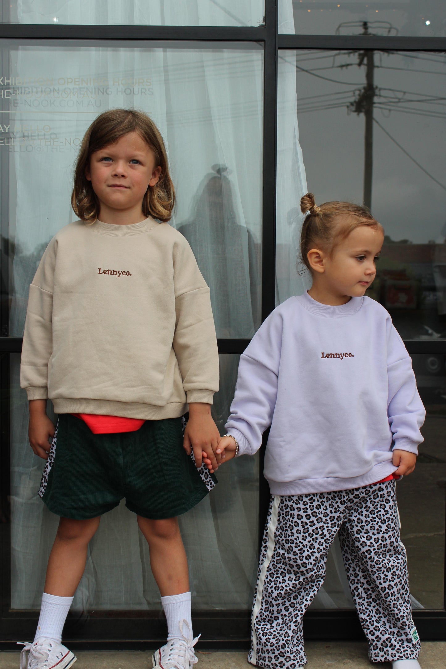 boy of 6 years old wearing size 4 green cord shorts