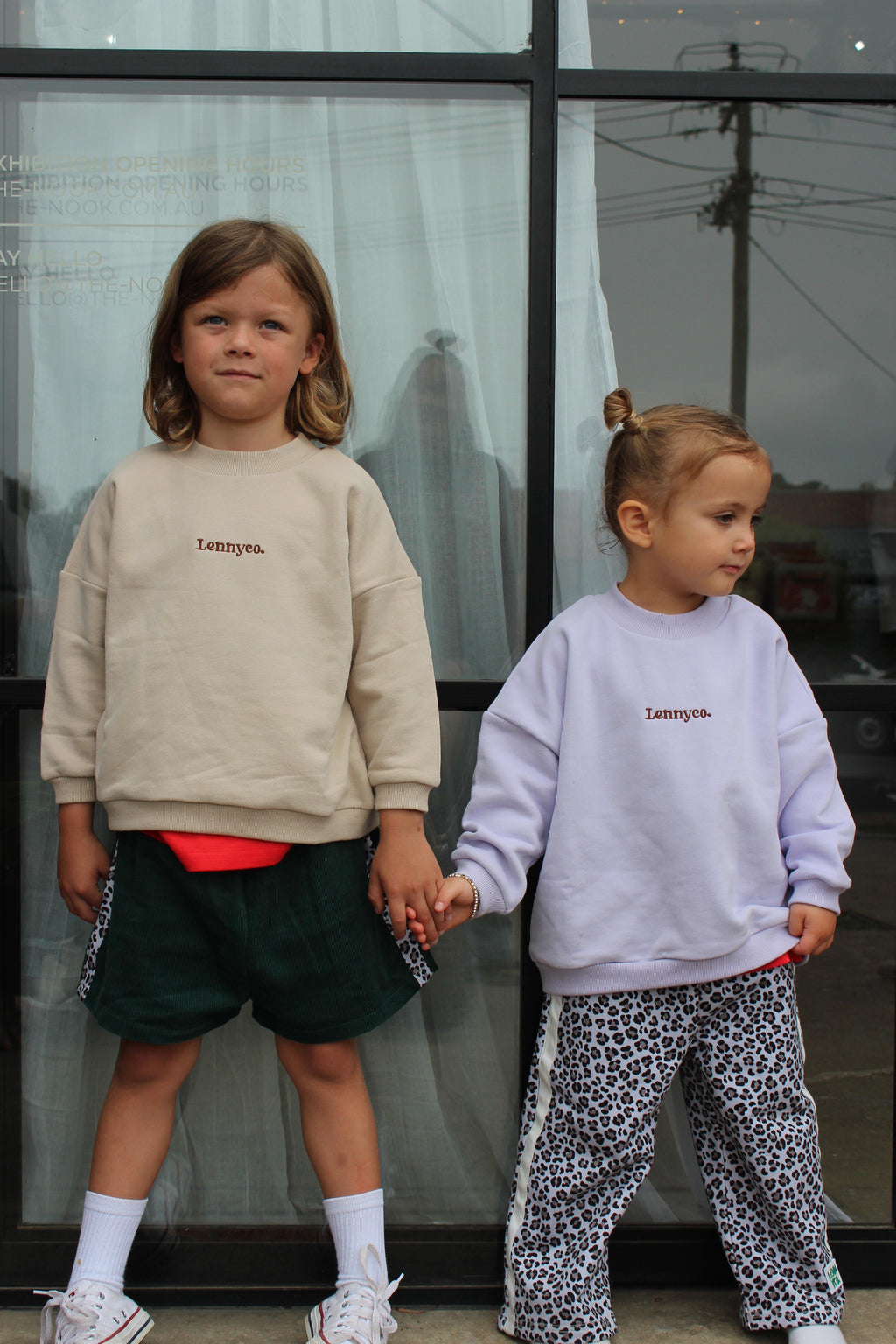 boy of 6 years old wearing size 4 green cord shorts
